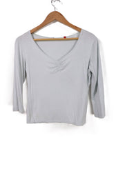 חולצה מנוקדת בתכלת- M-L